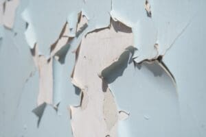 Peeling paint on an older New Hampshire home exterior by Miles Pro Painting