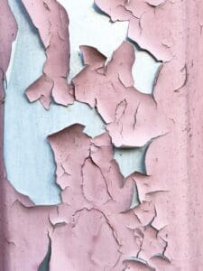Older New Hampshire home with peeling paint and weathered siding – Miles Pro Painting
